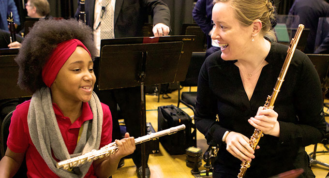 A flute teacher and a student