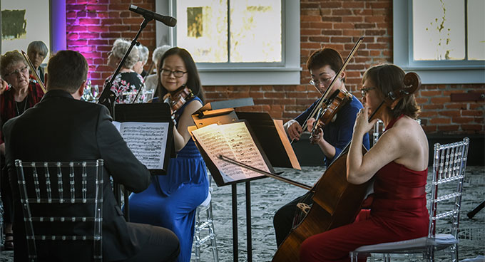 A quartet performs at a Symphony special event