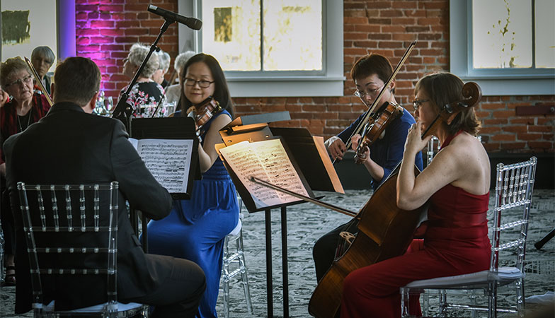 A quartet plays at a Symphony special event